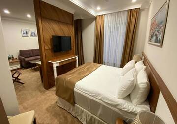 Фото номера Люкс Отель Boutique Hotel Kaspi г. Темиртау 7