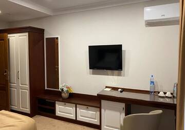 Фото номера Улучшенный двухместный номер с 2 отдельными кроватями Отель Boutique Hotel Kaspi г. Темиртау 5